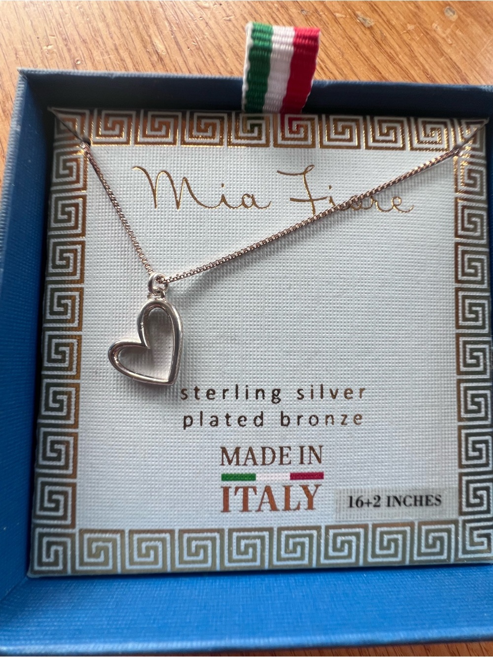Mia Fiore open heart pendant necklace crafted from sterling silver plated bronze